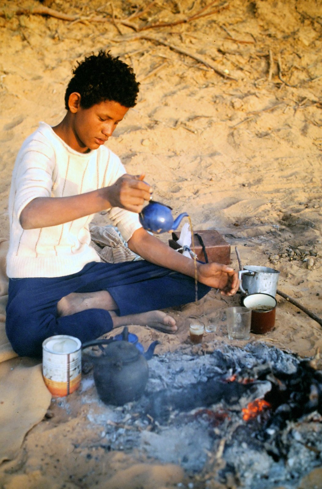 Green tea being prepared in a teapot