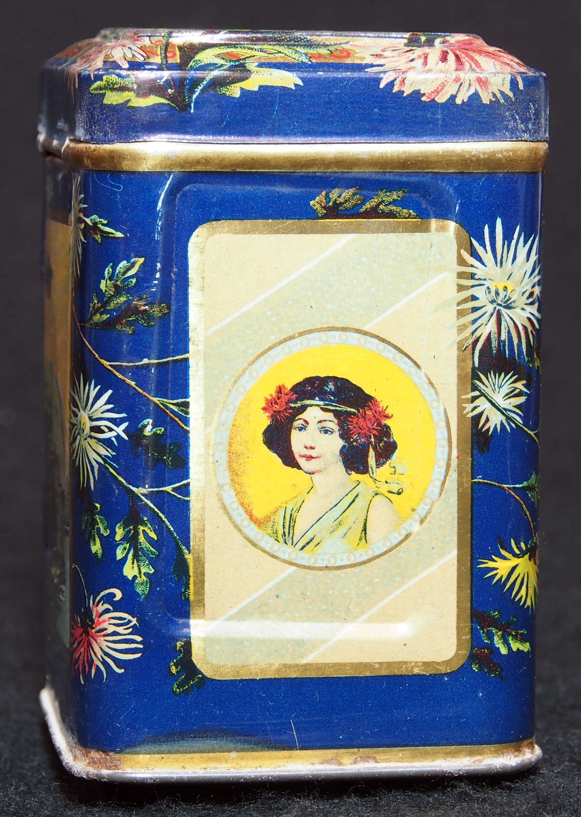 Airtight tins of loose leaf tea stored in a dark cupboard